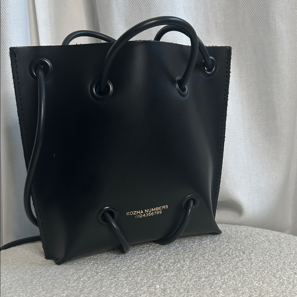 Kozha Numbers Shoulder Bag